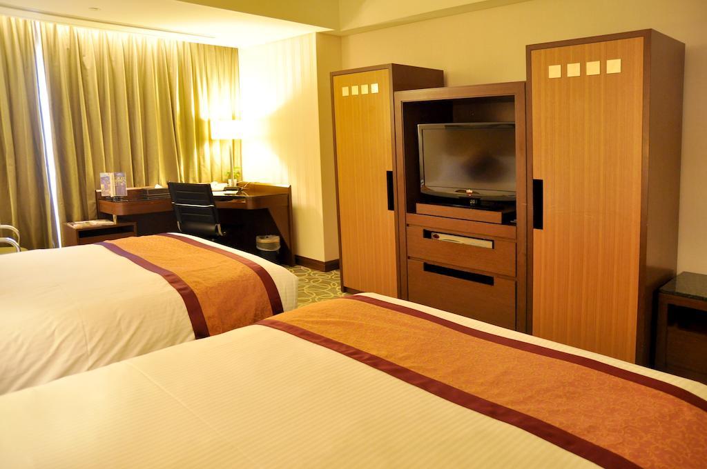 Evergreen Plaza Hotel - Tainan Zimmer foto Deluxe room